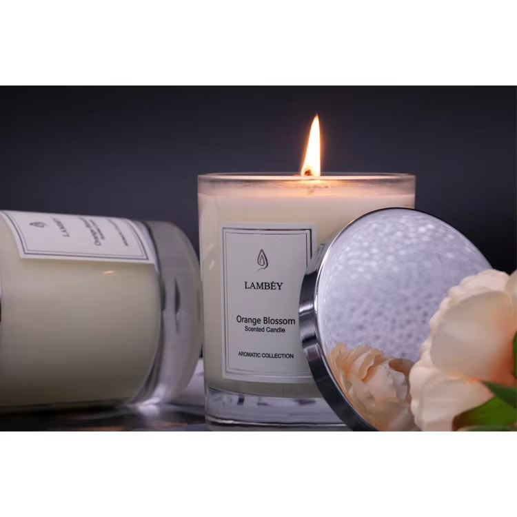 Glass candle with metal cover