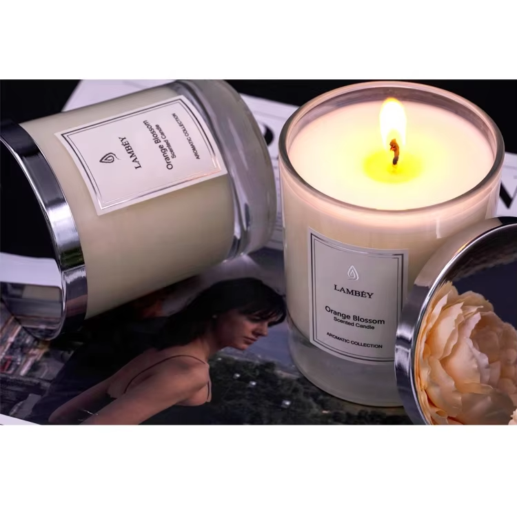 Glass candle with metal cover